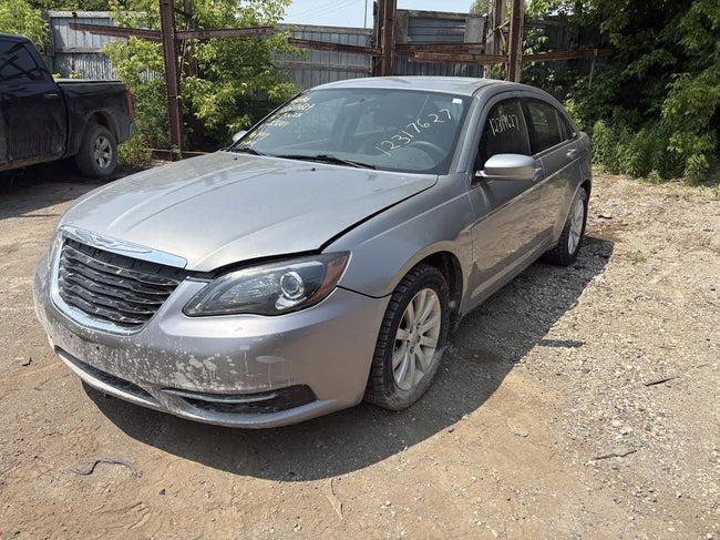 Used OEM Driver Side Chrome Bezel Head light fits 2011-2014 Chrysler 200 68088067AG